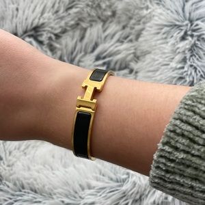 Hermes Clic H Bracelet gold and black enamel